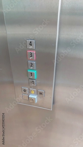 Obraz Remote Control Panel in an Elevator Displaying Selected Floors and Status Indicators