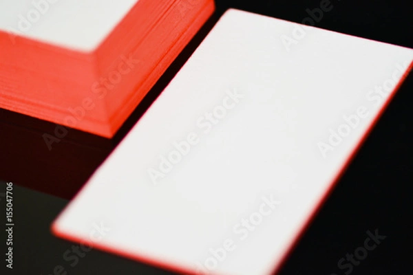 Obraz thick white cotton paper business card mock up with red painted edges. Blank business cards template.
