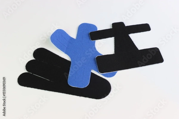 Fototapeta Different types of kinesiology tape to use in sports pain by athletes