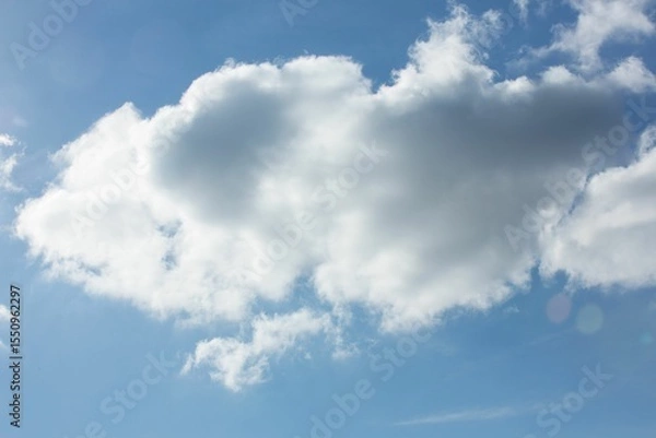 Obraz Flat design illustration is showing large fluffy cumulus cloud floating against bright blue sky