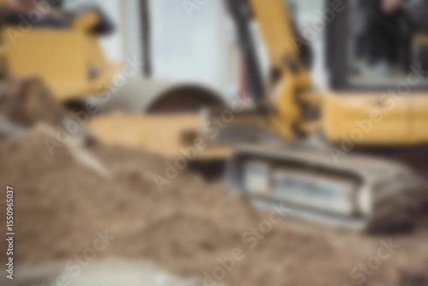 Obraz Bulldozer levelling mud at construction site