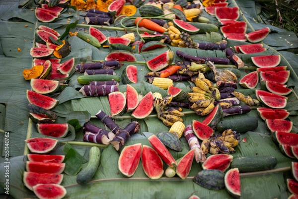 Fototapeta Watermelon slices and various fruits on banana leaves covered with banana leaves with various fruits. Elephant food at Thai Elephant Day, Elephant feeding fruit that it eats a lot of