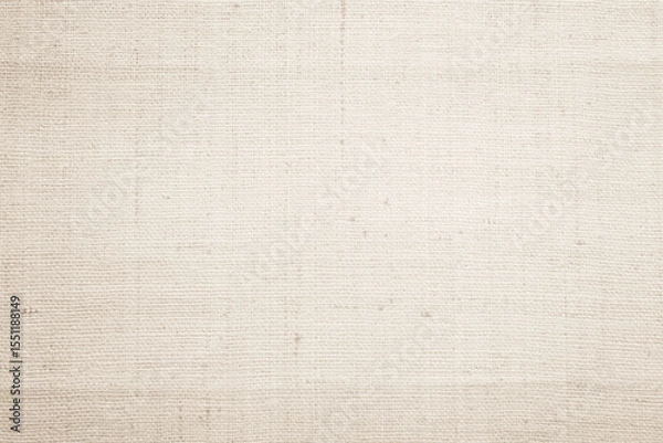 Fototapeta Brown sackcloth woven texture background in natural pattern. Jute hessian burlap, linen background in light beige cream color blank. Weaving canvas fiber line cotton cloth textured as organic.