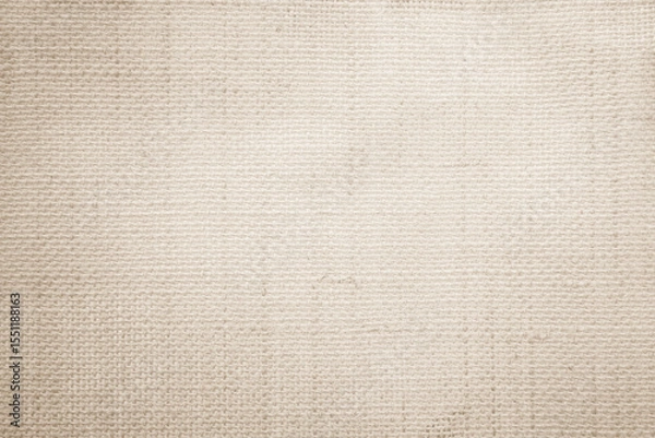 Fototapeta Brown sackcloth woven texture background in natural pattern. Jute hessian burlap, linen background in light beige cream color blank. Weaving canvas fiber line cotton cloth textured as organic.