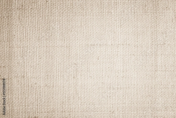 Fototapeta Brown sackcloth woven texture background in natural pattern. Jute hessian burlap, linen background in light beige cream color blank. Weaving canvas fiber line cotton cloth textured as organic.
