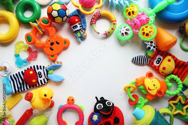 Fototapeta Children's toys and accessorieson a White background.view from above