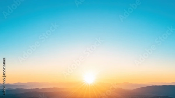 Obraz A beautiful blue sky with a sun shining brightly in the middle