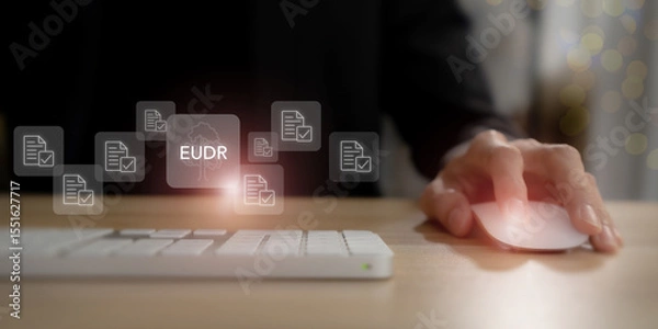 Obraz EUDR Compliance Concept. Using a computer mouse with icons of documents and checkmarks, representing verification, traceability and regulatory reporting. Traceability, sustainability and regulation.