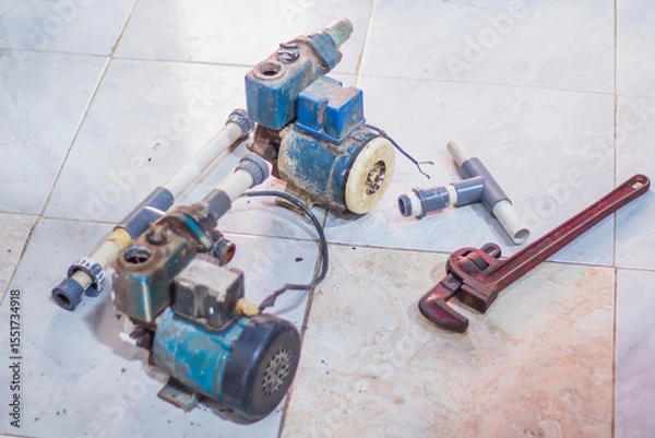 Obraz plumber fixing water pipe