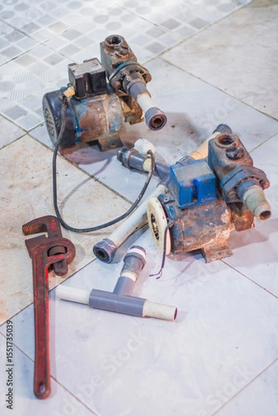 Obraz plumber fixing water pipe