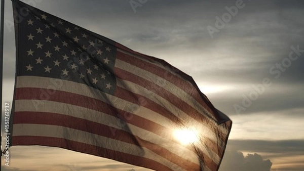 Obraz Close up USA American flag waving in the sky against sunset, sunrise outside background. Concept Fourth of July, 4th of July, Independence Day, Veteran Day, Holiday, Celebration. Freedom, Celebration