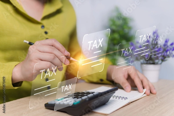 Fototapeta Concepts about paying all types of taxes, calculations for tax reduction planning, women use calculators to calculate income, expenses for sending to the Revenue Department for online inspection.