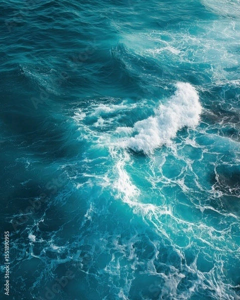 Fototapeta Pure blue turquoise water texture of the ocean sea with foam from and waves. MZ 