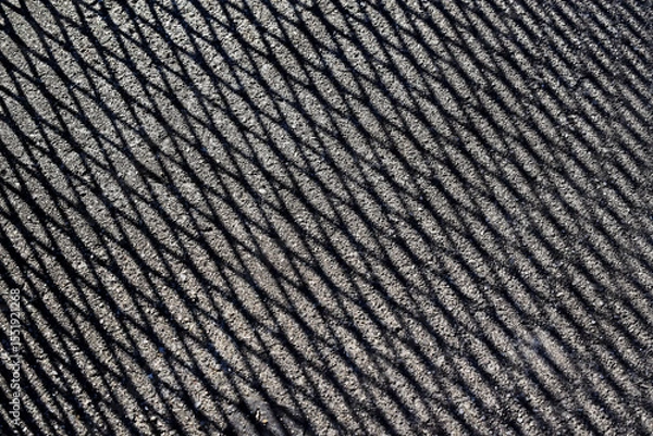 Fototapeta Grid shadows on concrete floor (detail) in Rio de Janeiro, Brazil