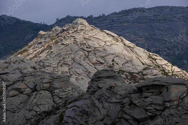 Obraz Layered Mountains and rocks illuminated by the sun, beautiful wild natural background in the Koktau mountain range