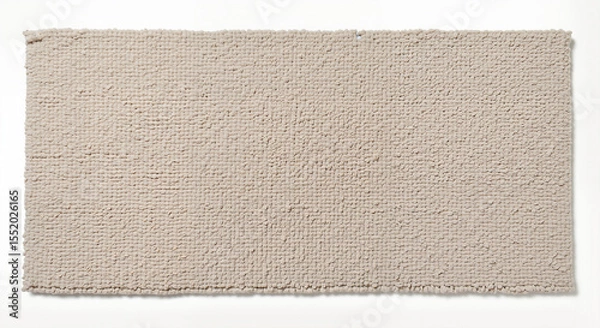 Fototapeta Textured beige rug with soft fibers on a light background for home decor concept