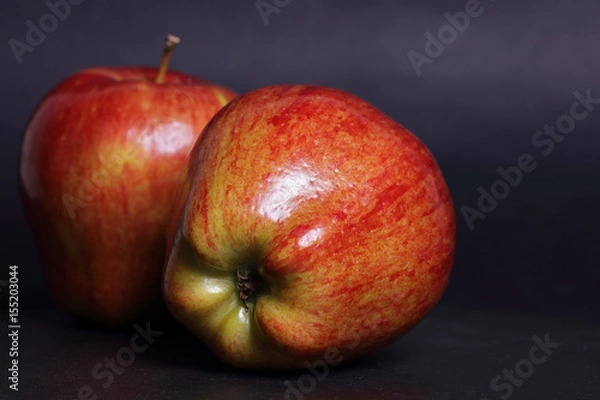 Obraz Red apples on black background. Healthy eating concept.