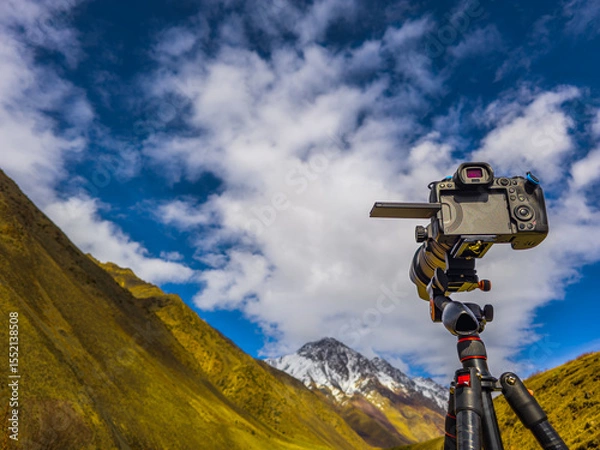 Obraz Camera capturing serene mountain landscape during daytime in Kyrgyzstan