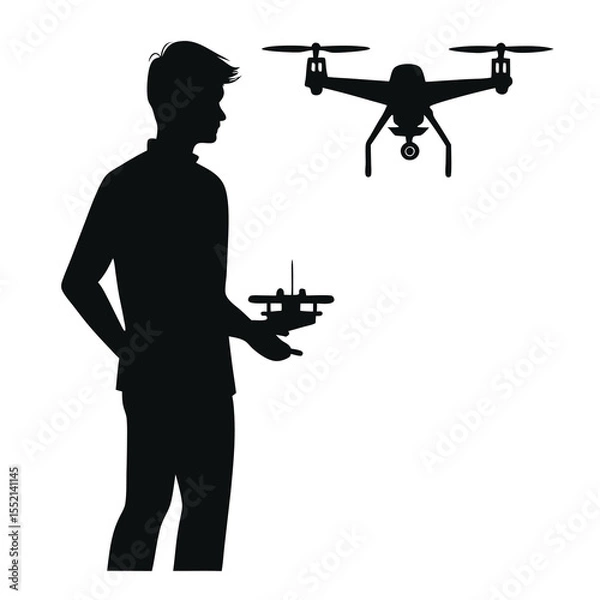 Fototapeta Silhouette of a man holding a drone controller with a drone flying