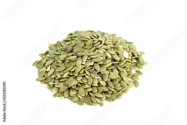 Obraz A pile of peeled pumpkin seeds isolated on white background.