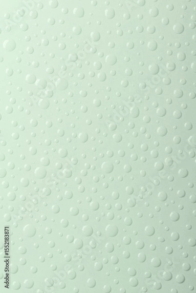 Fototapeta Light green background with water drops. Banner with raindrops. Top view.