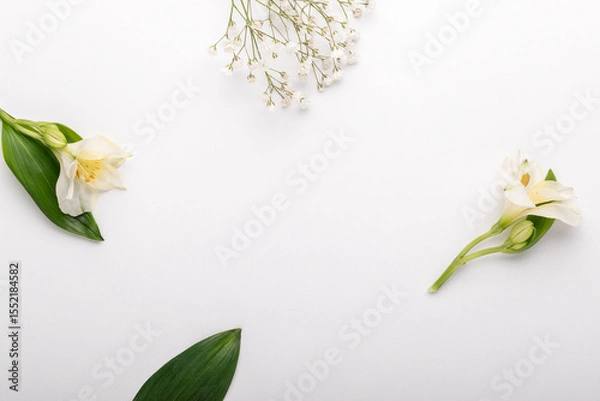 Fototapeta Minimal concept made with flowers on white background.