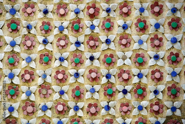 Fototapeta Colorful Floral Pattern with Geometric Design on Wall Surface
