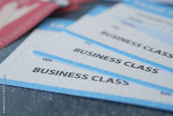 Fototapeta Travel tickets for a business class journey ready for use
