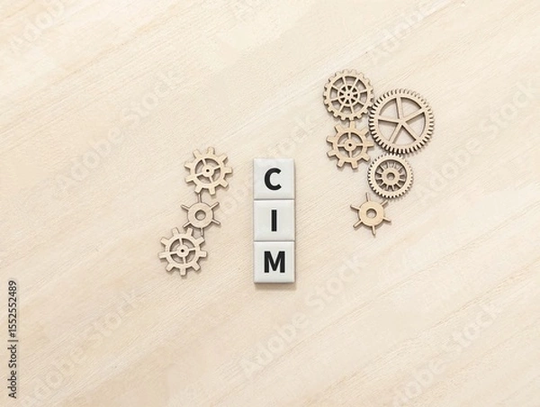 Obraz Cogwheels and square mosaic with letters SIM stand for Computer Integrated Manufacturing. technology