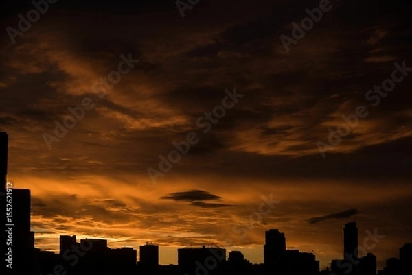 Obraz Silhouette city against cloudy sky during sunset