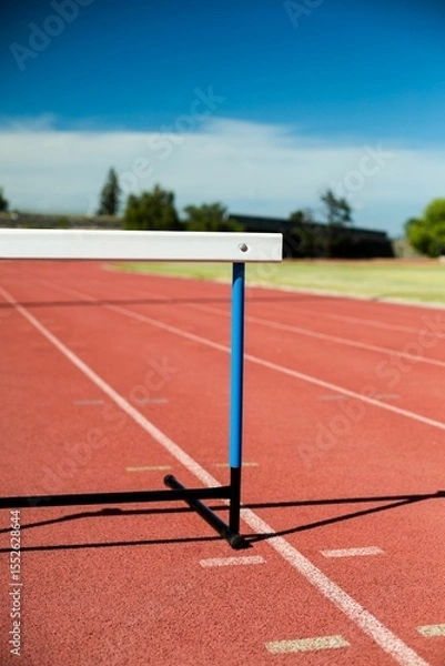 Fototapeta Close-up of hurdle on running track