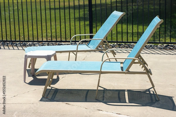 Fototapeta Retro pool chairs and table on deck