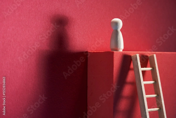 Obraz Man was climbing up the ladder having a goal.