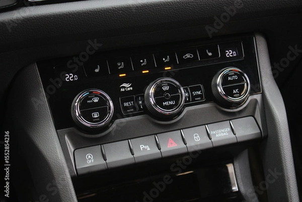 Fototapeta New car Climate Controls. Car air conditioning control. AC Temperature Panel Board. Dual Digital Climate Control Panel. Buttons for turning on car air conditioner.