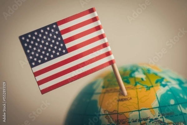 Fototapeta Close up flag of the United states of America marking at US geography on globe with white background copy space. America country, 4th July, geography, map, history education and so on concept.