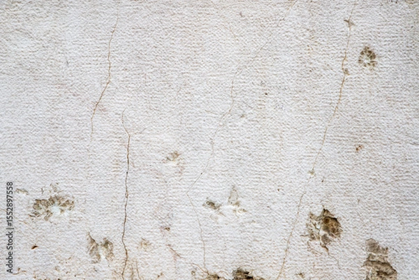 Fototapeta Close-Up of Wall with Textured Surface and Peeling Paint