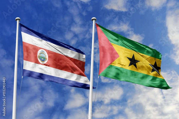 Fototapeta Costa Rica and Sao Tome and Principe National Flags Waving Together Under a Clear Blue Sky, Symbolizing Bilateral Relations and Global Cooperation.
