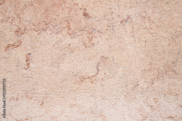 Fototapeta Textured Beige Plaster Wall Background with Cracks and Natural Patterns