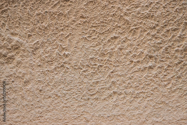 Fototapeta Beige Rough Textured Wall Surface with Abstract Pattern Background