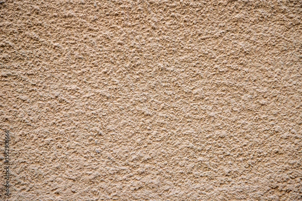 Fototapeta Beige Rough Textured Wall Surface with Abstract Pattern Background