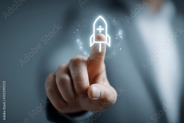 Fototapeta High quality photo of businessman touching a rocket icon with a plus sign on a virtual screen. Close-up view of a hand and finger pointing at a space ship symbol floating in the.