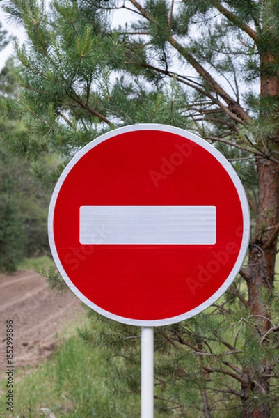 Obraz No entry sign on the road in the forest. Conceptual image.