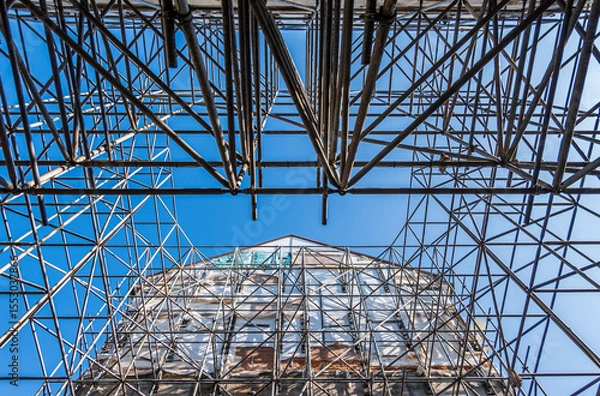 Fototapeta typical scaffolding at a construction site
