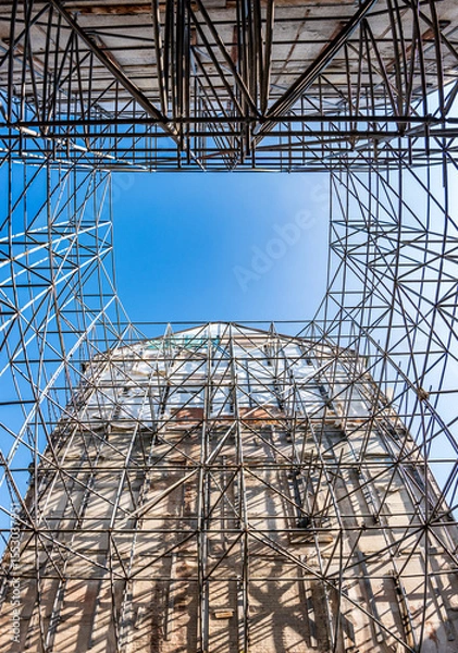 Fototapeta typical scaffolding at a construction site