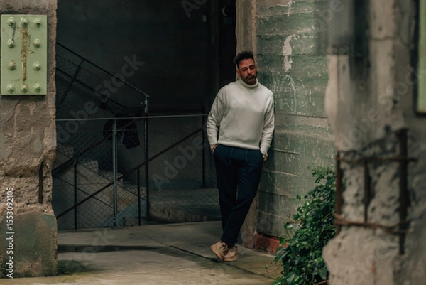 Obraz adult man visiting or traveling walking in ancient monument