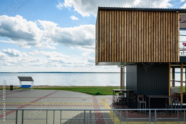 Fototapeta Cafe building at the beach of lake.