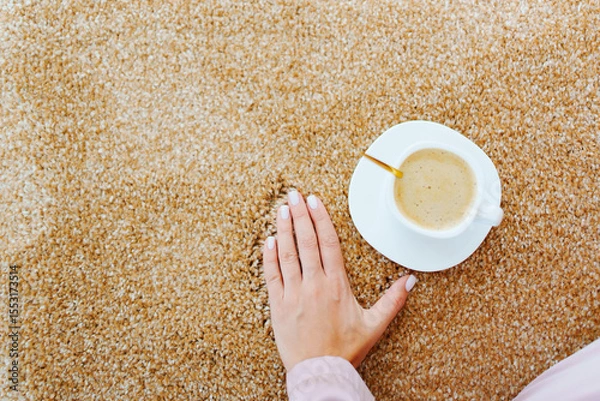 Obraz close-up. a cup of coffee on the beige Interior pile carpet.