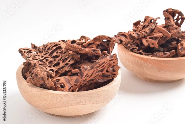 Obraz Close-up of Ant Nest (Myrmecodia pendans), a traditional medicinal plant with porous, woody structure, isolated on white background.