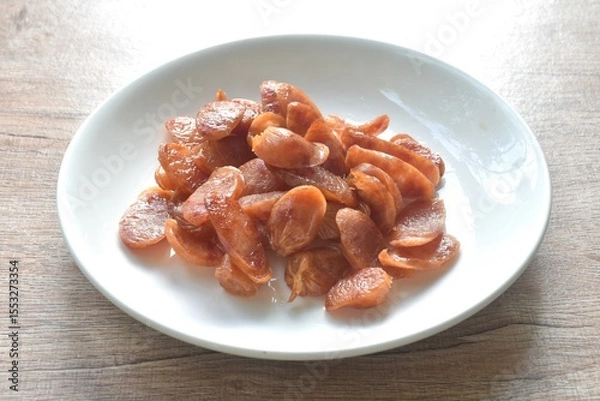 Obraz crispy fried slice Chinese pork sausage arranging on plate
