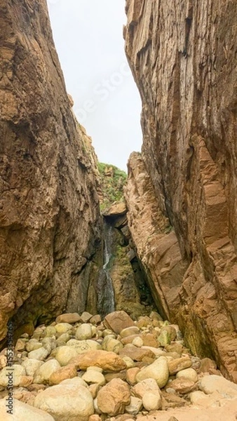Fototapeta Majestic rocky gorge whispers ancient secrets and echoes folklore, perfect for Earth Day musings or serene geotourism contemplations